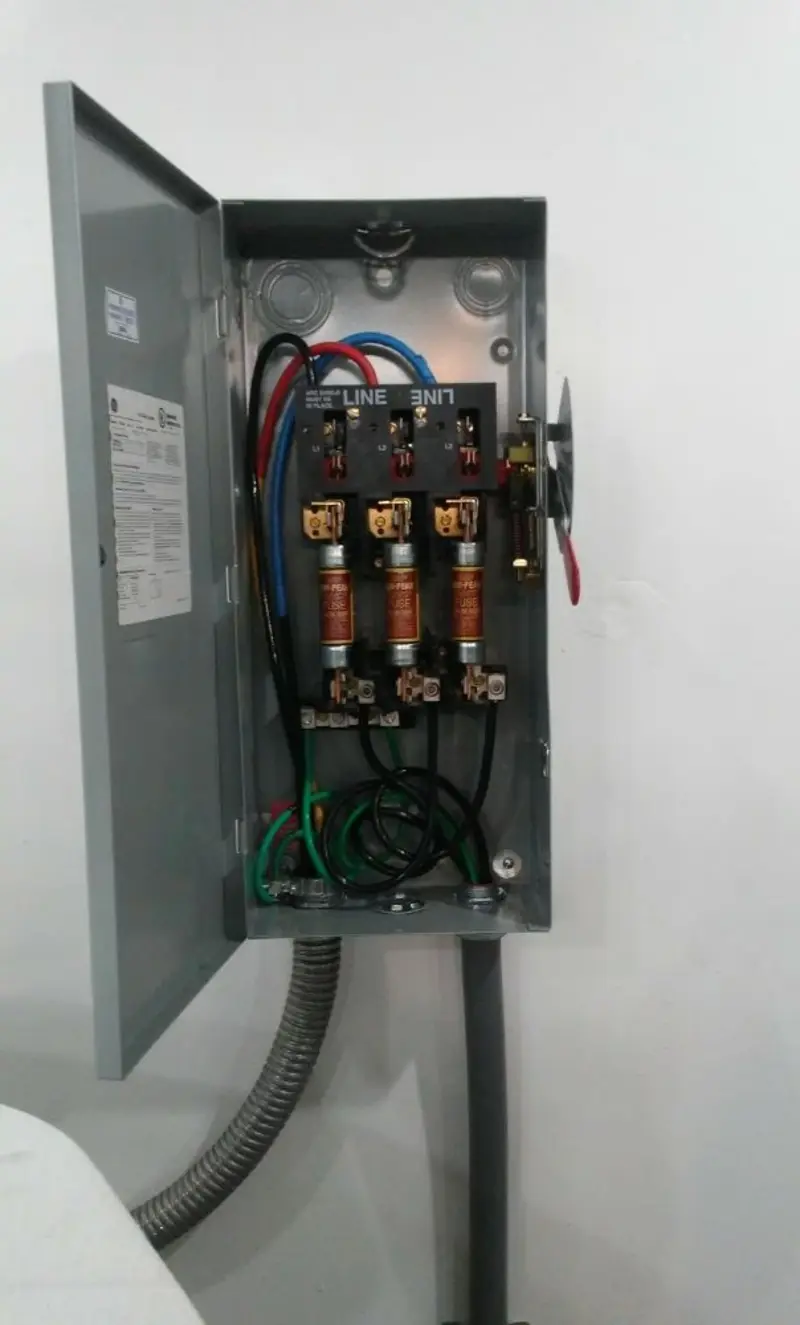 Three-phase disconnect switch installed for Smoke Detector Installation in Riverdale