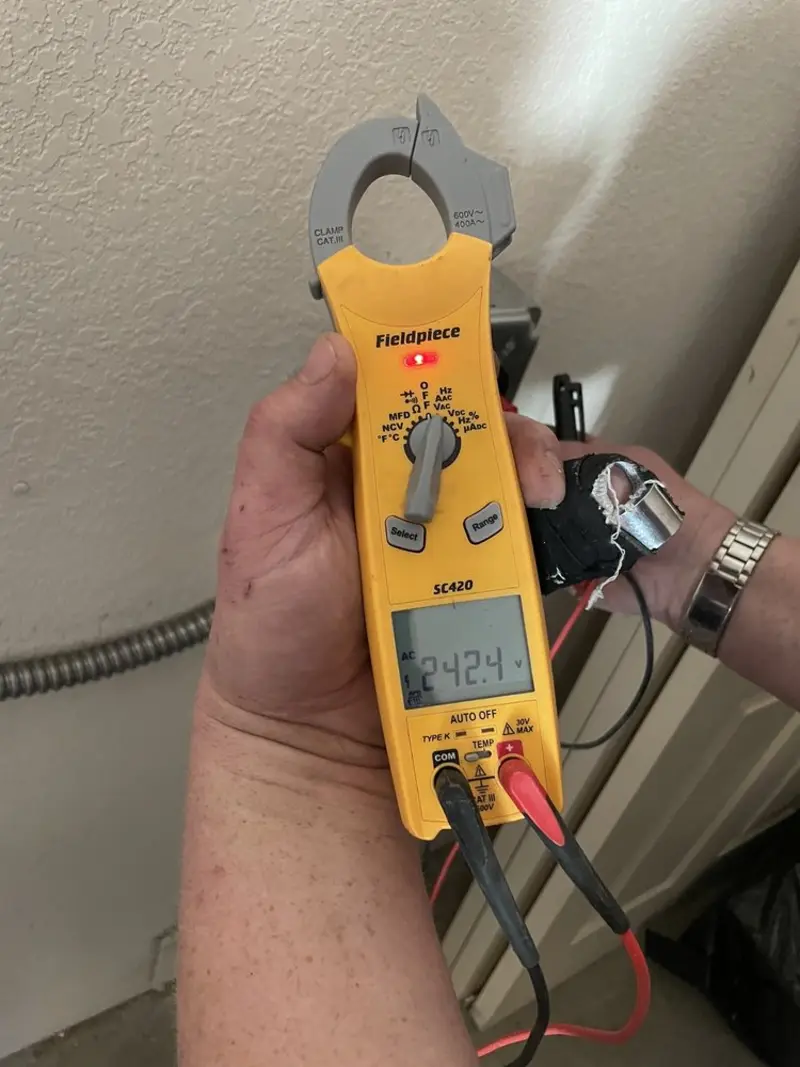 Voltage testing with clamp meter during Hot Tub / Pool Electrical Wiring in Riverdale